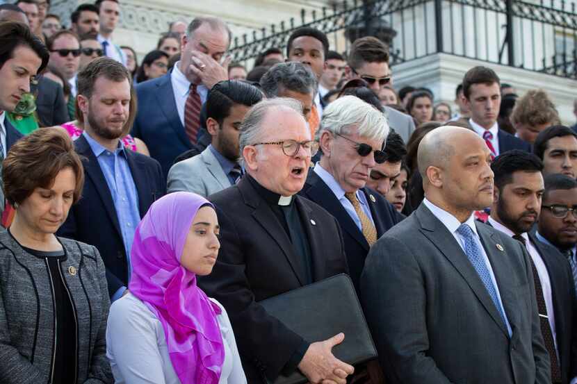 The Rev. Patrick Conroy, chaplain of the House of Representatives, delivers an interfaith...