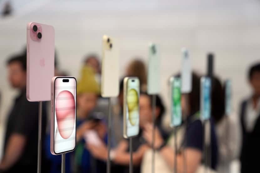 iPhone 15 and 15 Plus models are displayed during an announcement of new products on the...