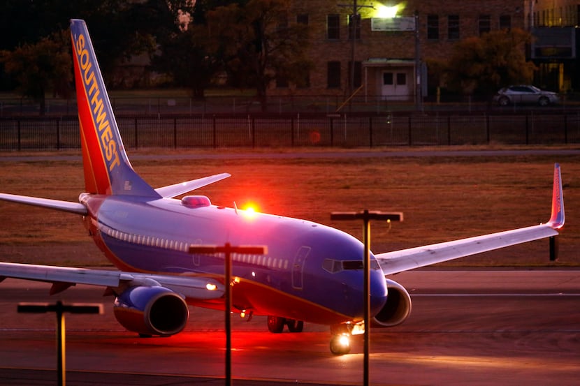 A Southwest Airlines jet taxis to the terminal at Dallas Love Field on Oct. 17, 2019.
