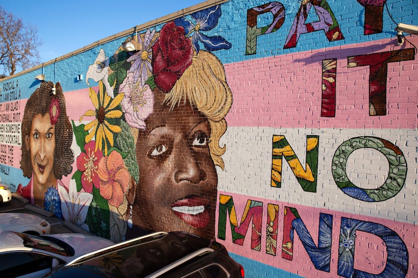 A mural on Cedar Springs Road in Oak Lawn, photographed on December 29, 2021, commemorates...
