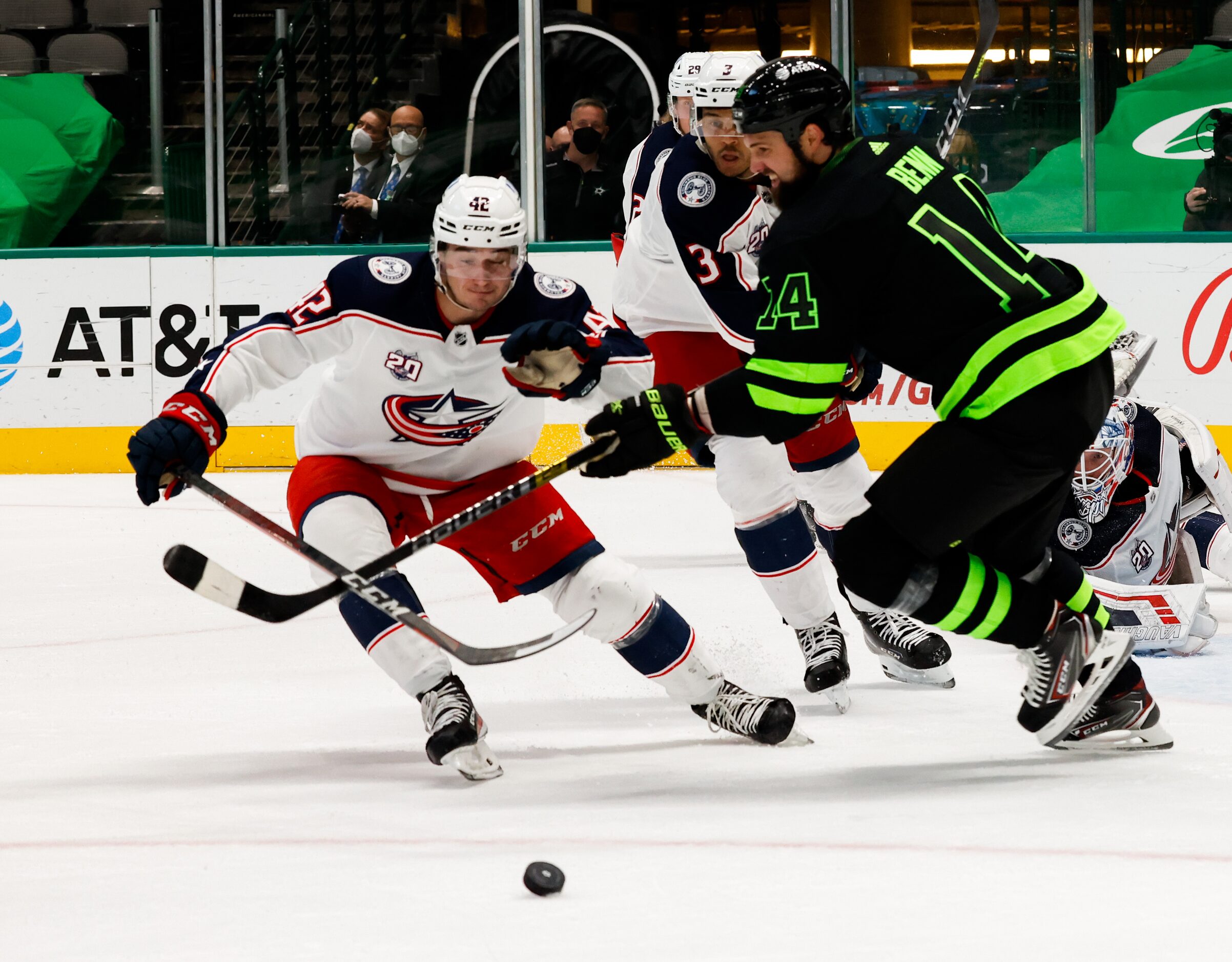 Dallas Stars left wing Jamie Benn (14) and Columbus Blue Jackets center Alexandre Texier...