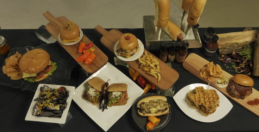 Legends Executive Chef Orazio LaManna displays some of the food Tuesday March 4, 2014 that...