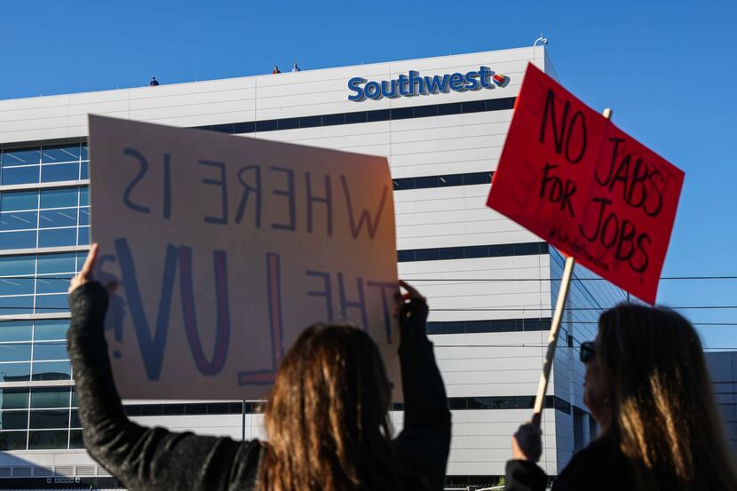 People gather to protest mandate on COVID-19 vaccines at Southwest Airlines headquartes in...