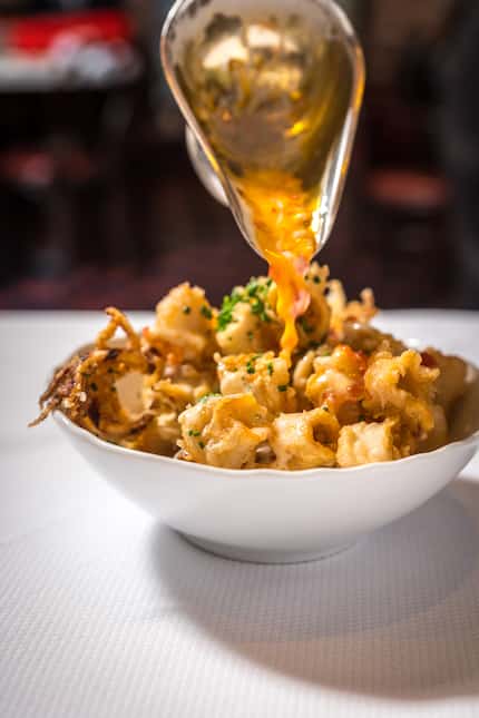 Calamari Marco is named after Mario Carbone's mentor, chef Mark Ladner. It's one of the...