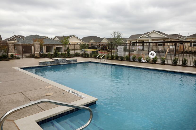 The Avilla rental home community in McKinney includes a pool and community center.