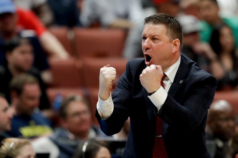 Texas Tech coach Chris Beard shouts during the second half of the team's NCAA men's college...