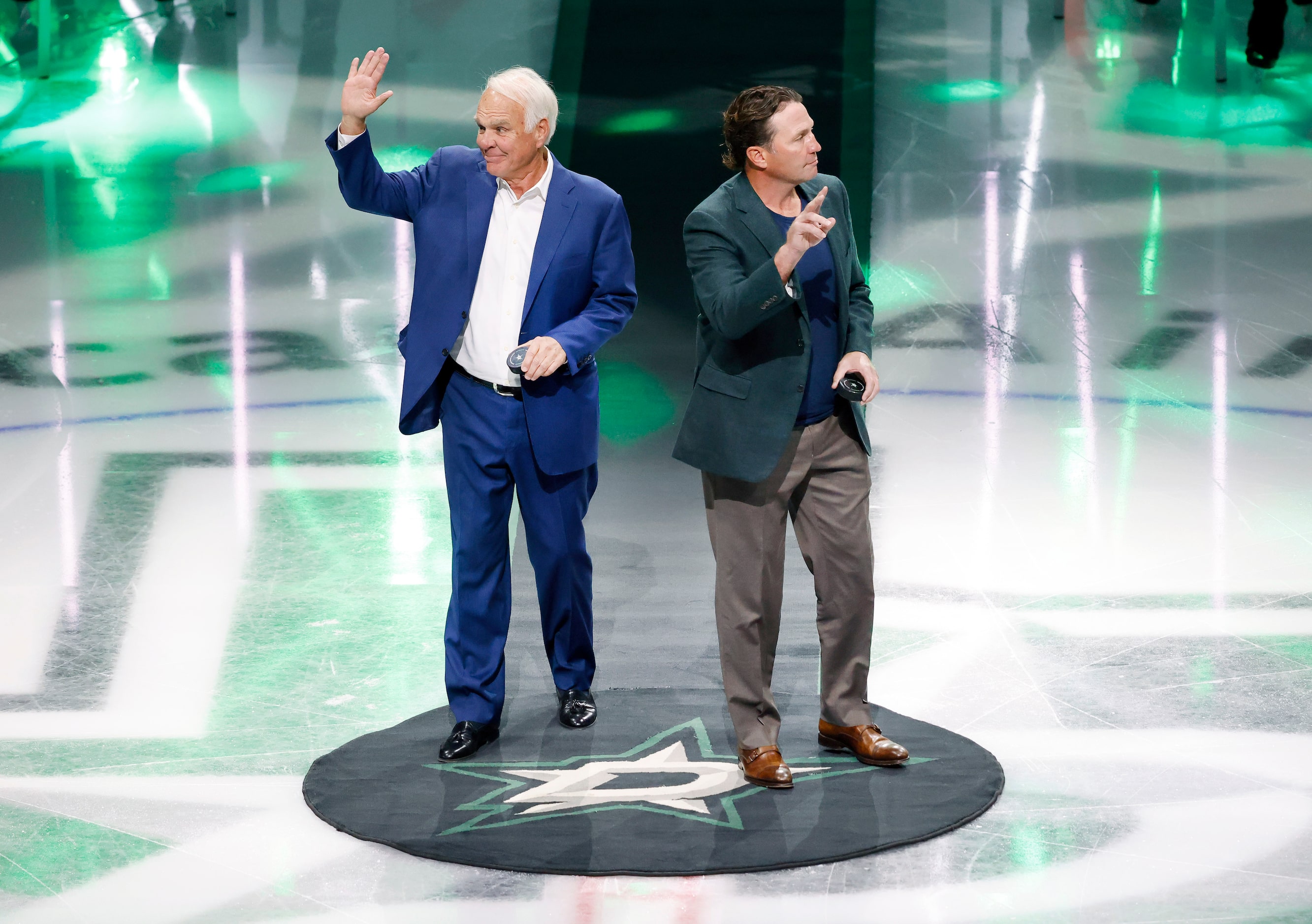 Dallas Stars Hall of Fame inductees, former Dallas Stars president Jim Lites (left) and...