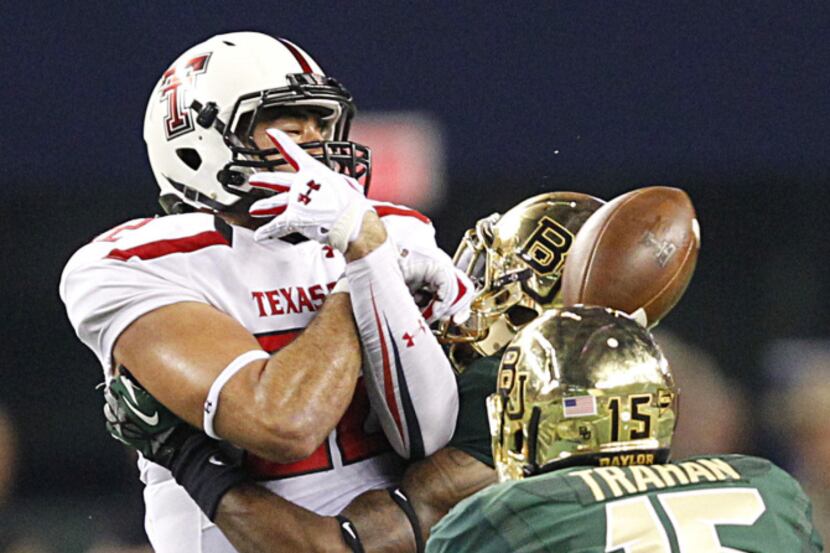 What appeared as a pass completion by Texas Tech Red Raiders tight end Jace Amaro (22) is an...