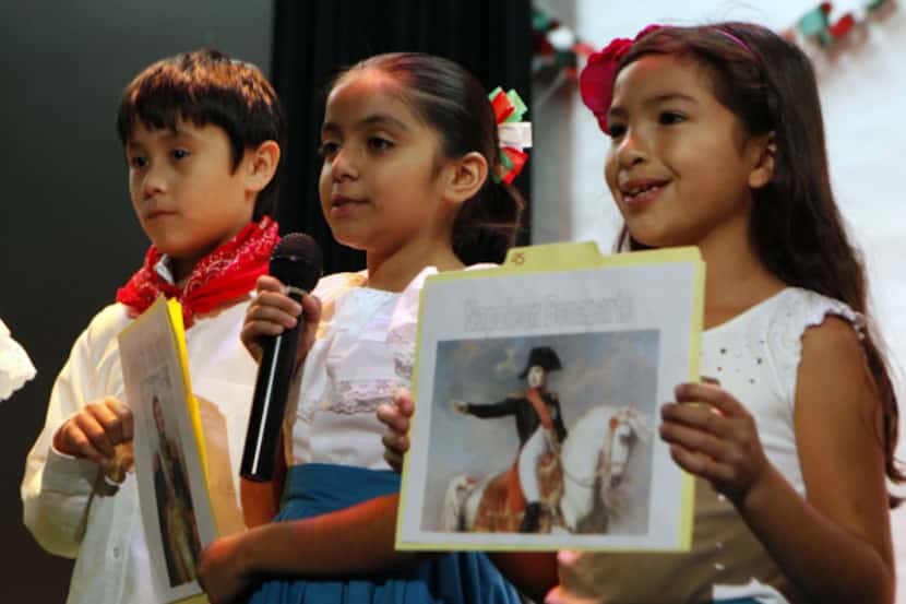 From left: Marcus Guevera, Victoria Villanueva  and Anabella Lopez read in Spanish and...