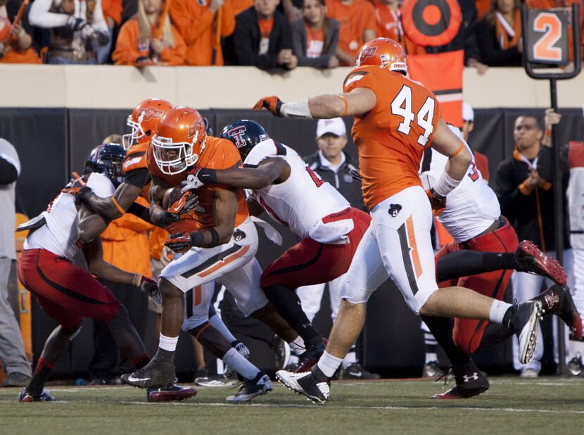 Nov 17, 2012; Stillwater OK, USA; Oklahoma State Cowboys running back Joseph Randle (1) runs...