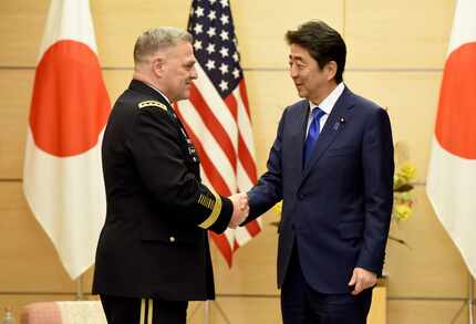 U.S. Army Chief of Staff Gen. Mark Milley (left) visit with Japanese Prime Minister Shinzo...