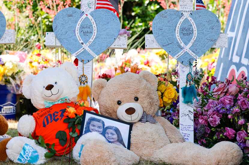 Crosses of Allen Outlets Mall shooting victims, sisters Daniela and Sofia Mendoza on...