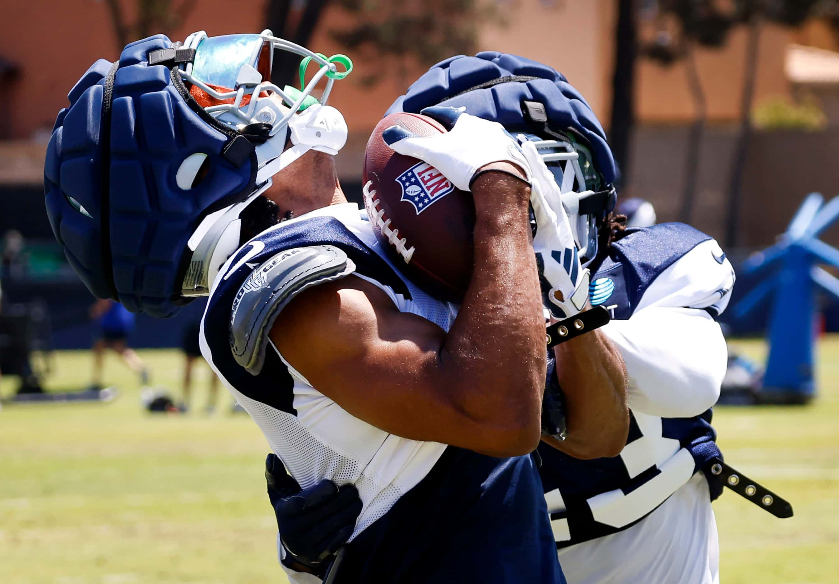 Dallas Cowboys wide receiver Jalen Tolbert (1) makes an over-the-shoulder catch against...