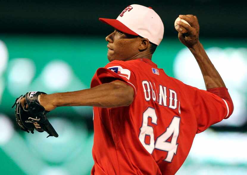 Texas P Alexi Ogando in action during the Chicago White Sox vs. Texas Rangers major league...