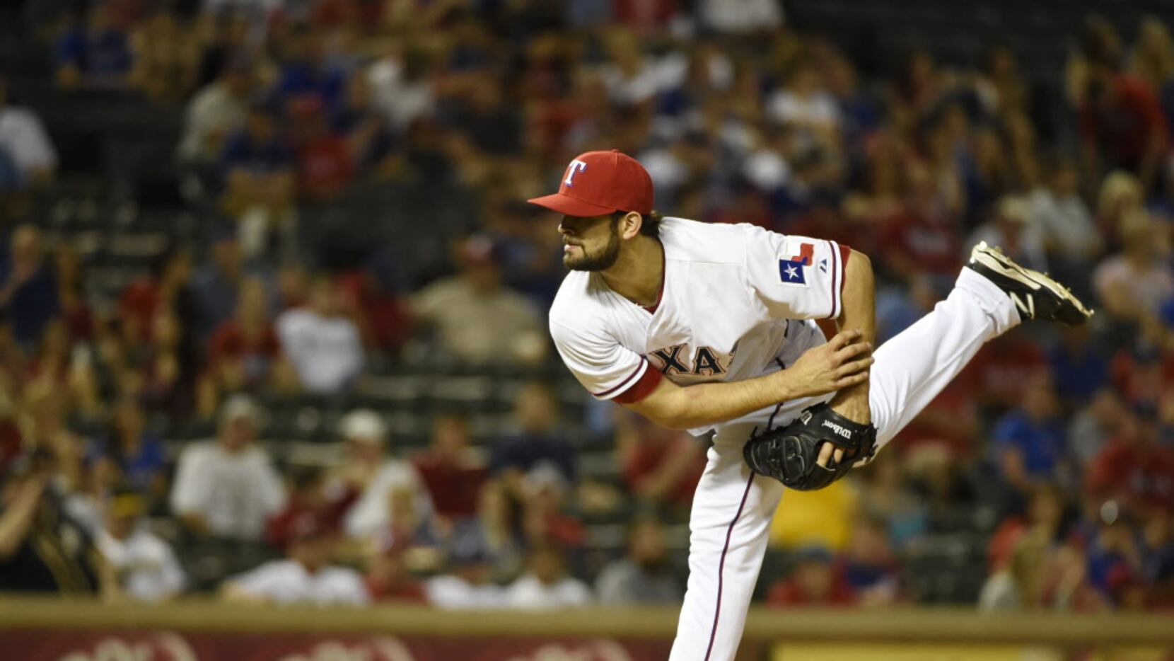 Texas Rangers relief pitcher Nick Martinez (22) pitches during their MLB baseball game...