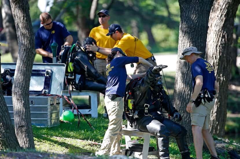  FBI diversÂ got ready to search an area of Turtle Creek for evidence on Wednesday. (Jae S....