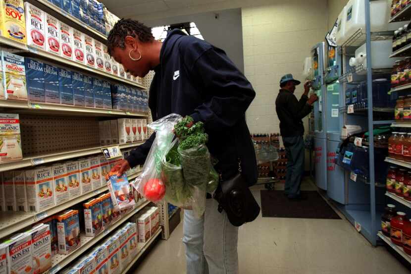 In this file photo, Peggy Jones shops for soy milk at Ann's Health Food Center and Market in...