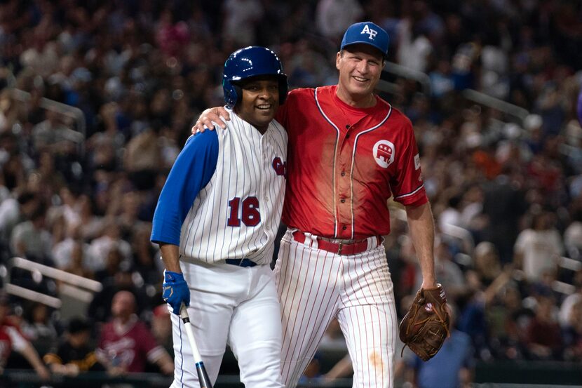 Rep. Don Davis, left, D-N.C., and Rep. August Pfluger, R-Texas, smile during the annual...