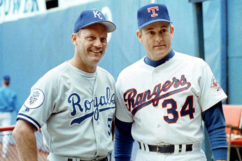Kansas City Royals third baseman George Brett, left, and Texas Ranges pitcher Nolan Ryan...