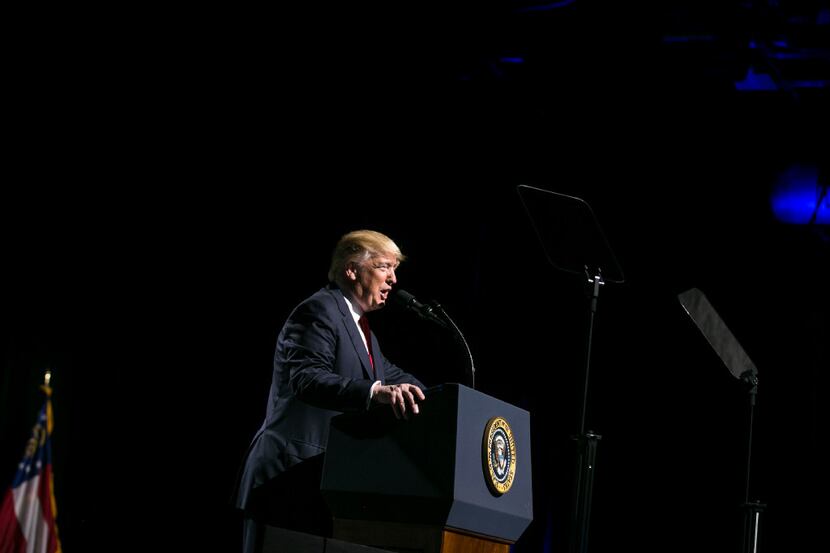 President Donald Trump speaks at the National Rifle Association's annual convention in...