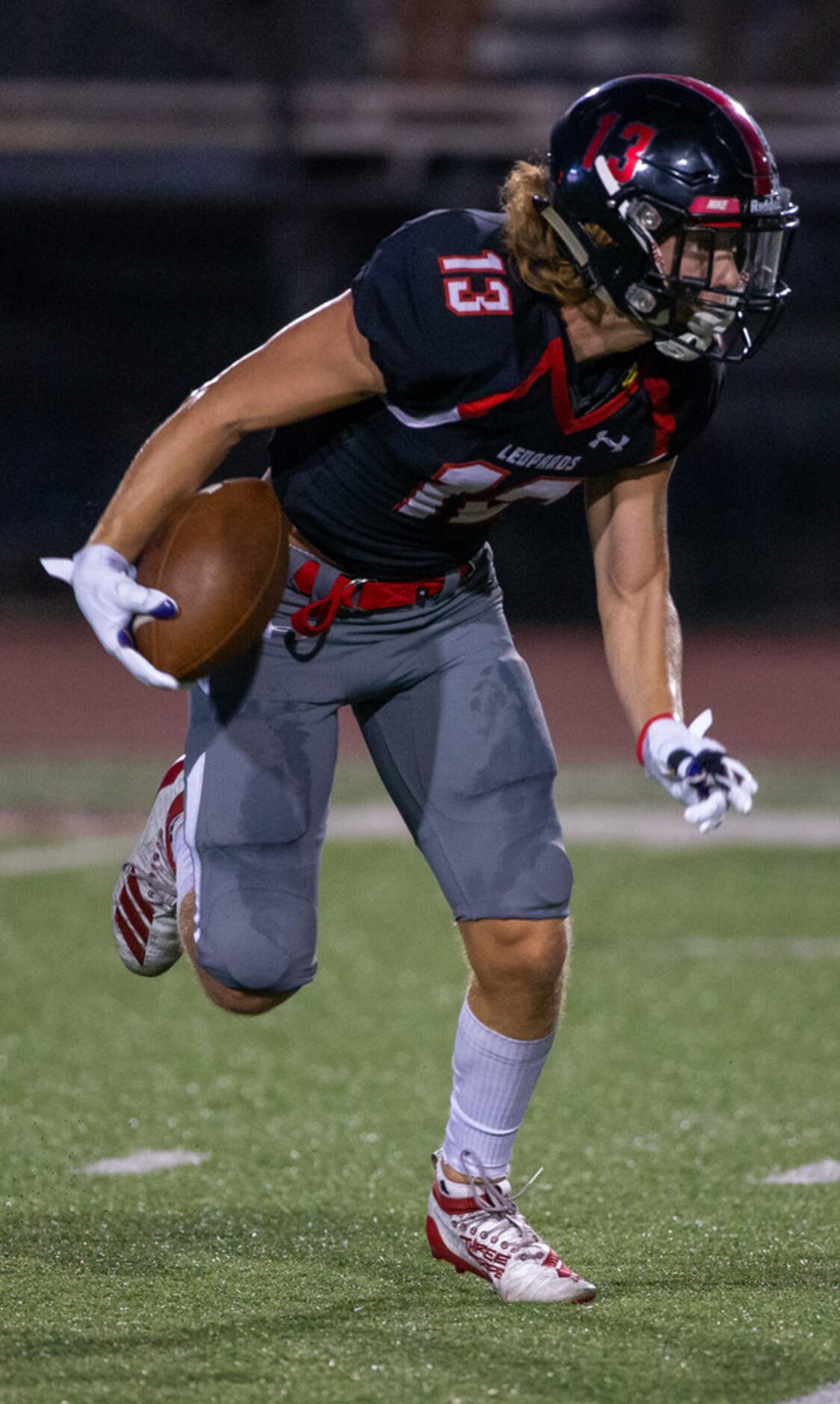 Lovejoy wide receiver Luke Mayfield (13) runs a pass during the second quarter in the...