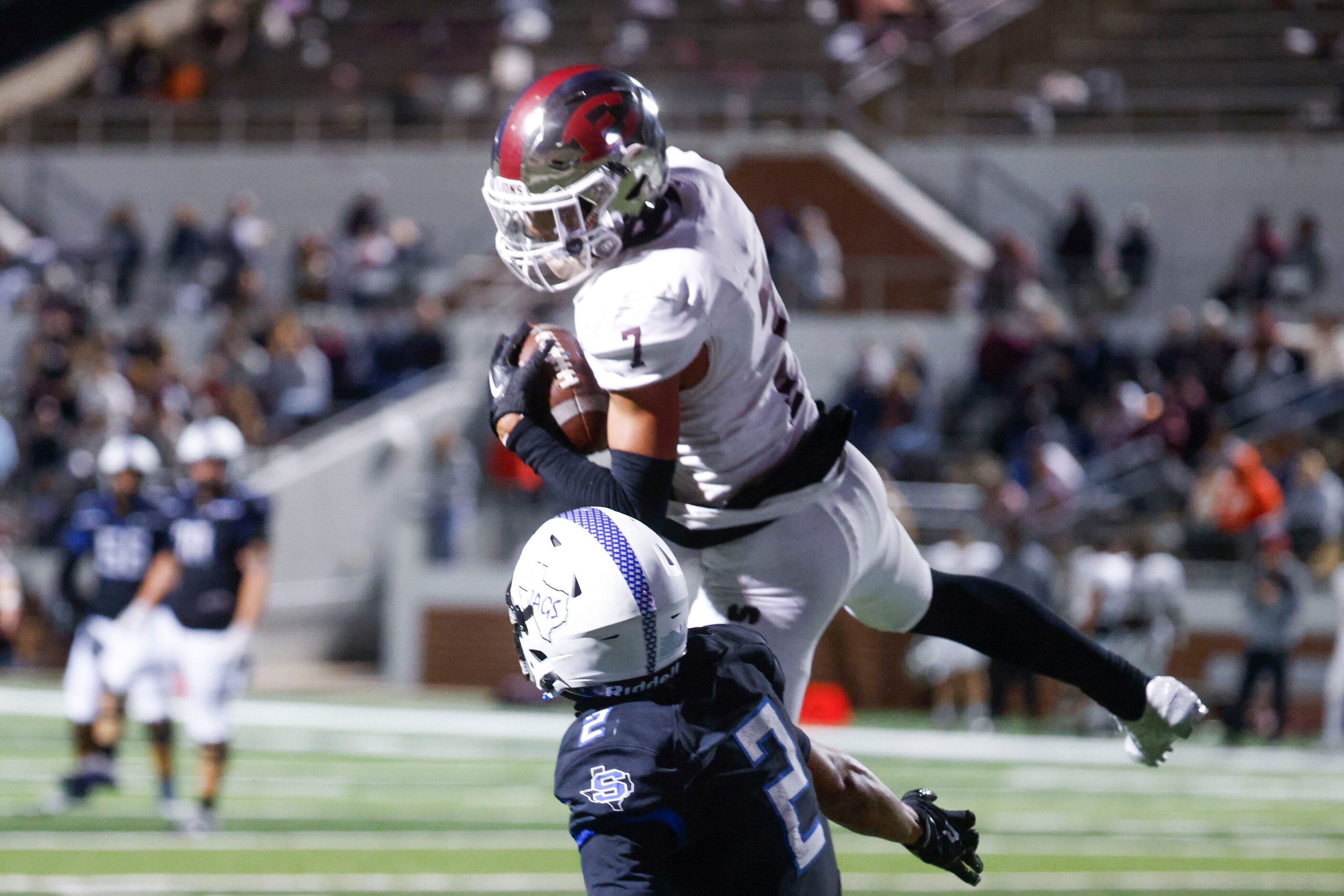 Ennis High’s Wondame Davis (7) breaks up a pass for Mansfield Summit High’s Joseph Williams...