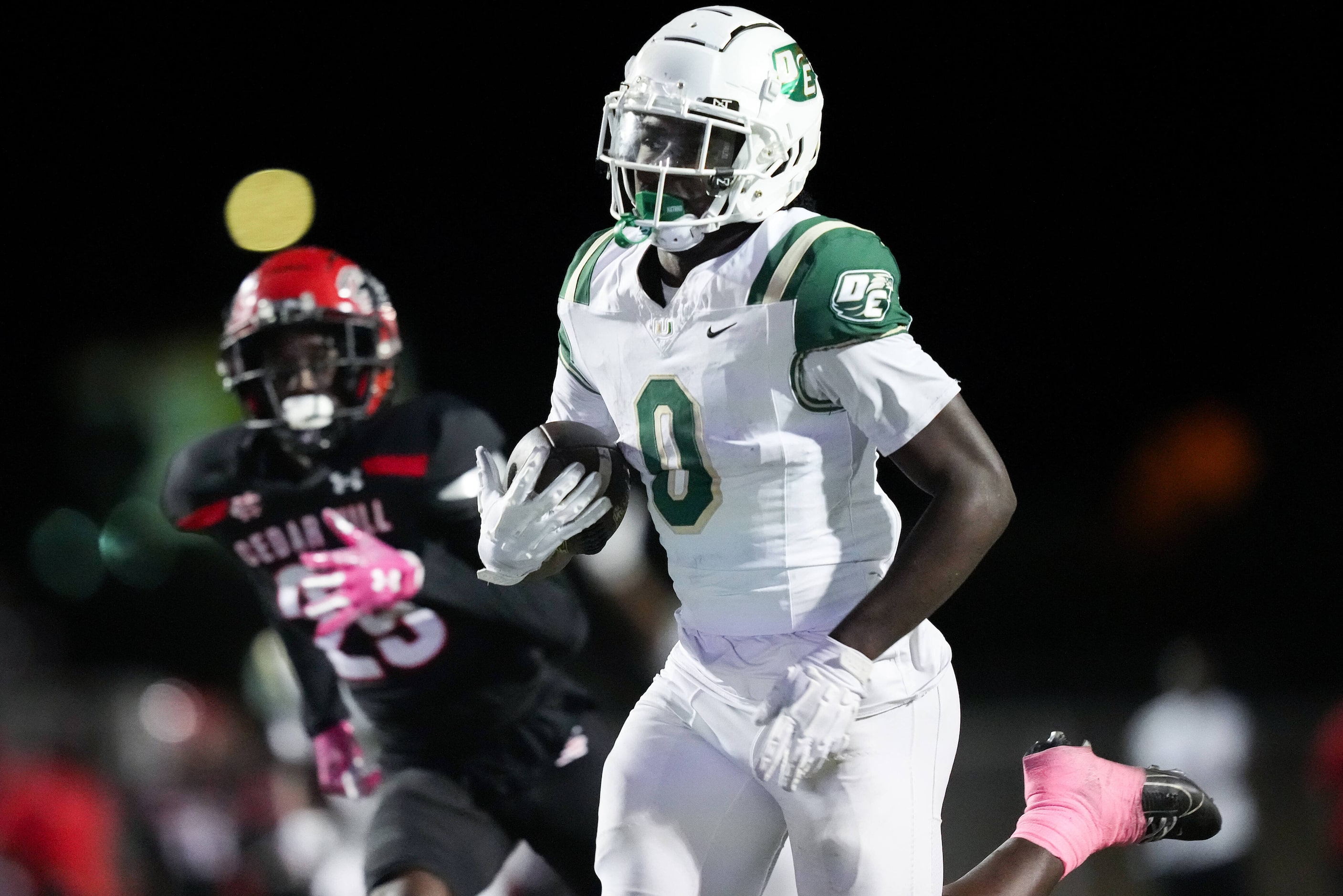 DeSoto running back Myson Cook-Johnson (0) races 41-yard for a touchdown during the second...