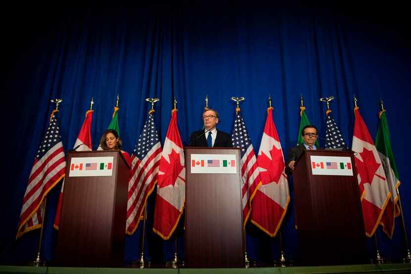 U.S. Trade Representative Robert Lighthizer (center), Canadian Foreign Minister Chrystia...