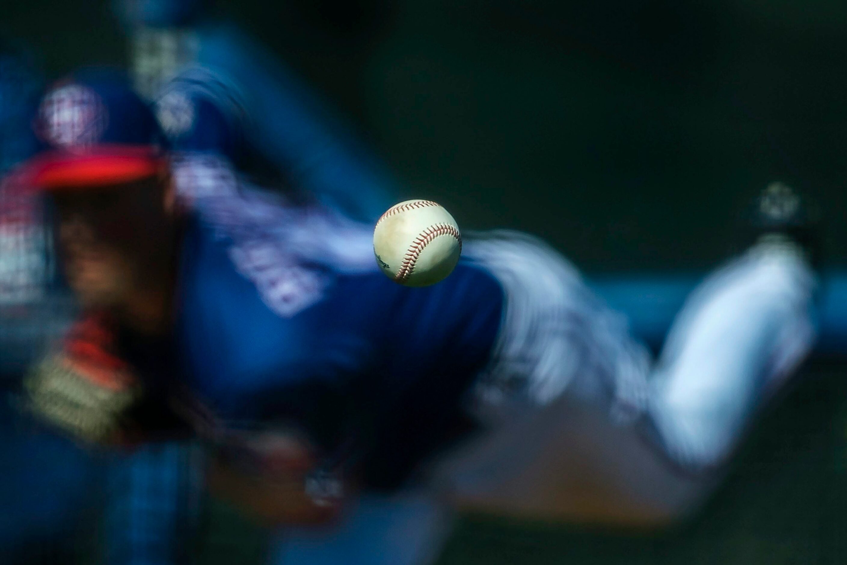 Texas Rangers pitcher Joe Palumbo throws live batting practice during a spring training...