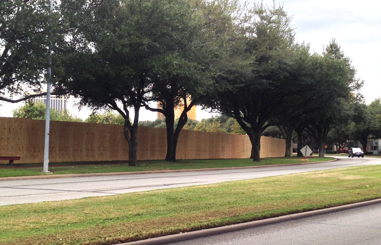 Construction fencing stretches along Southwestern Boulevard in The Village.