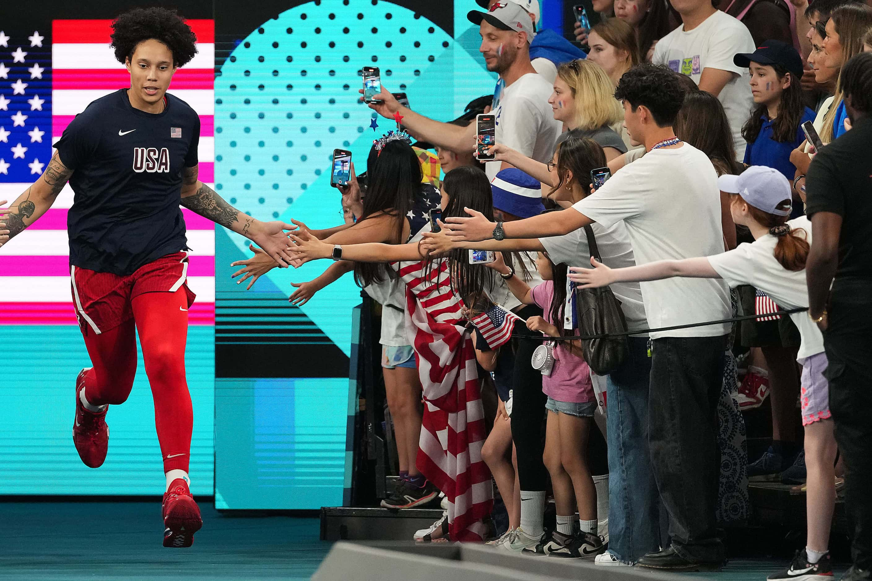 Brittney Griner (15) of the United States takes the court for the first half of the women’s...