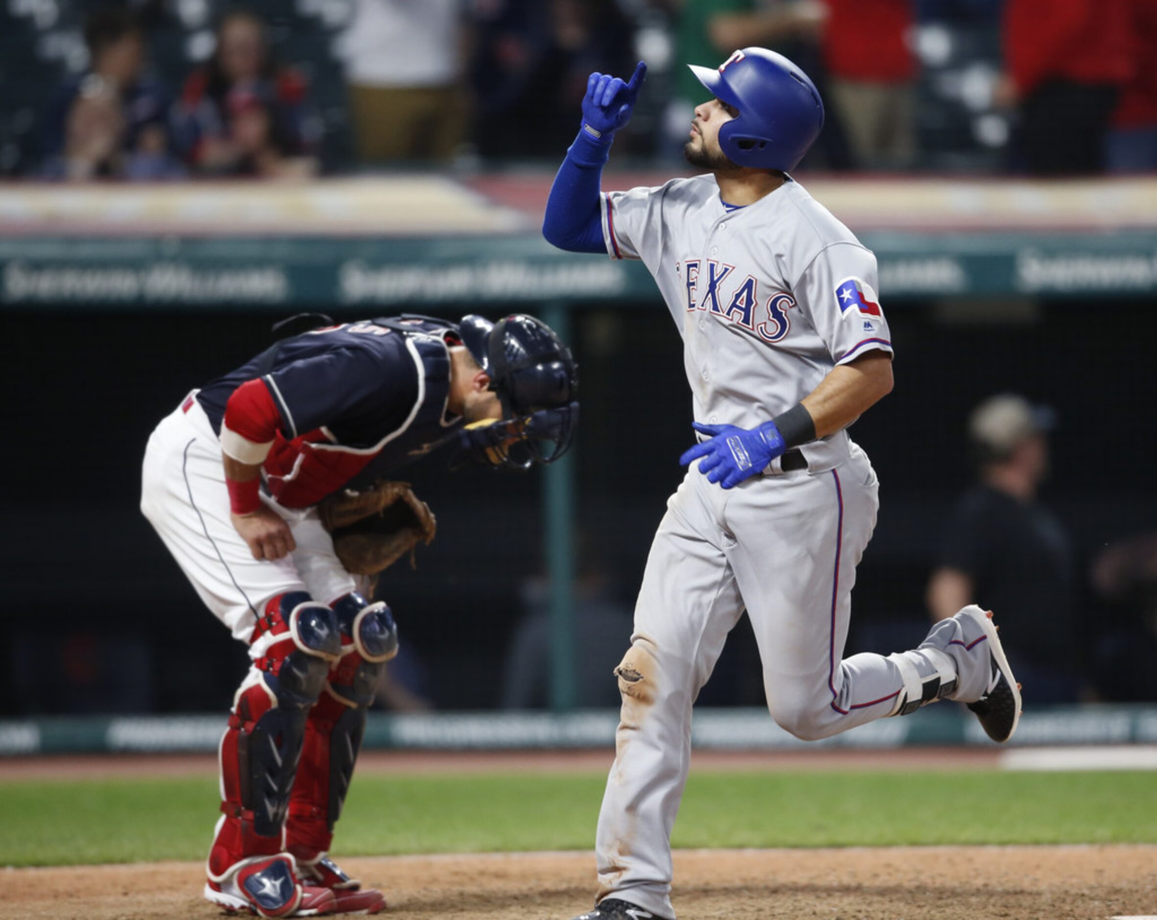 CLEVELAND, OH - MAY 01: Isiah Kiner-Falefa #9 of the Texas Rangers celebrates after hitting...