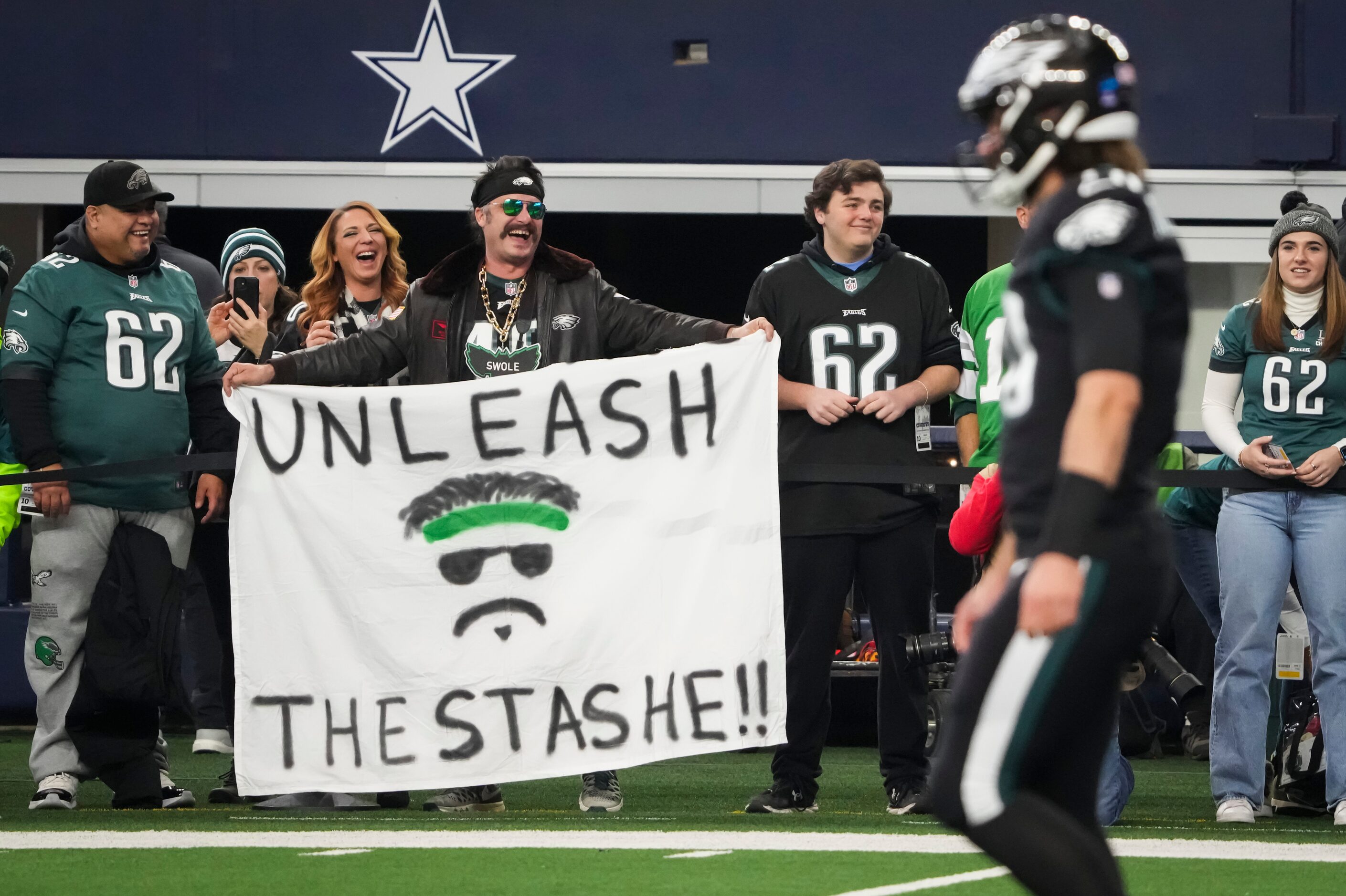 Philadelphia Eagles fans cheer quarterback Gardner Minshew (10) as the teams warm up before...