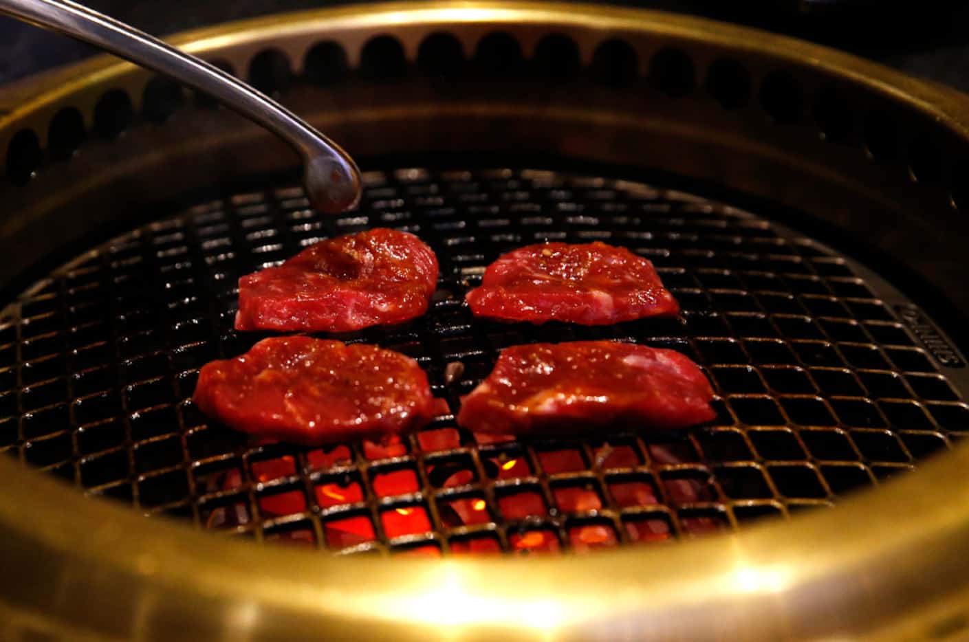 New York steak cook on the grill at Niwa Japanese BBQ in Dallas on June 4, 2017.. (Tailyr...