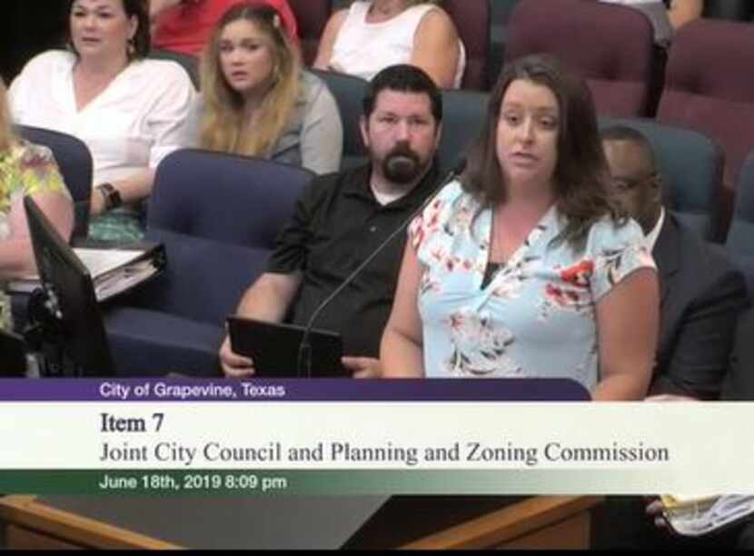 Jennifer Pharris speaks before the Grapevine City Council in June 2019 to answer questions...