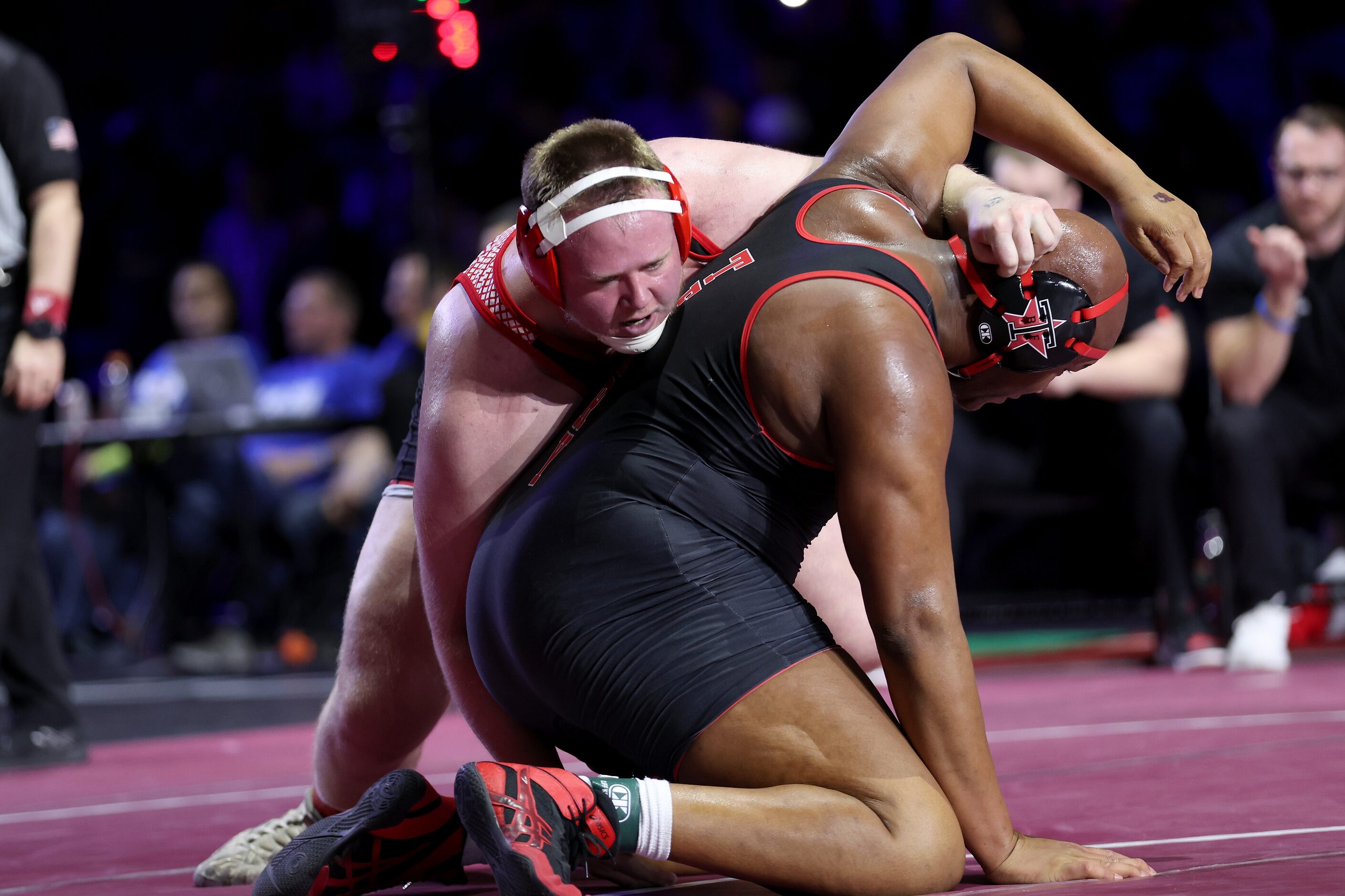 Sam Reynolds of Lovejoy (red) competes against Cameron Lewis of Rosenberg Terry in the Boys...