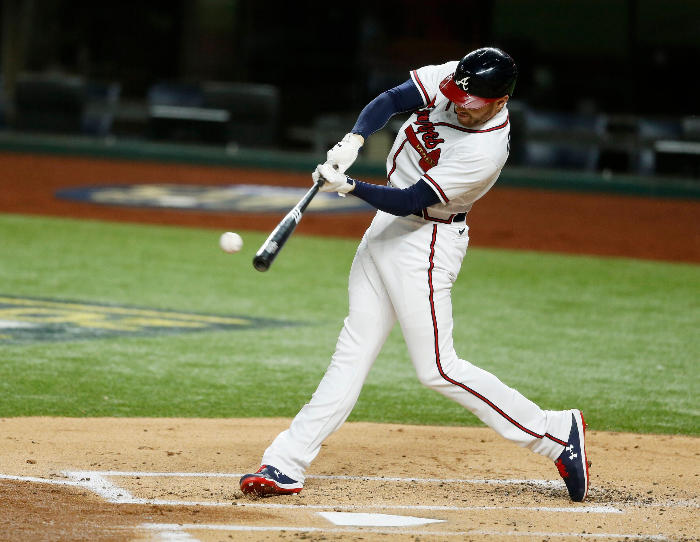 Atlanta Braves first baseman Freddie Freeman (5) hits a double off of Los Angeles Dodgers...