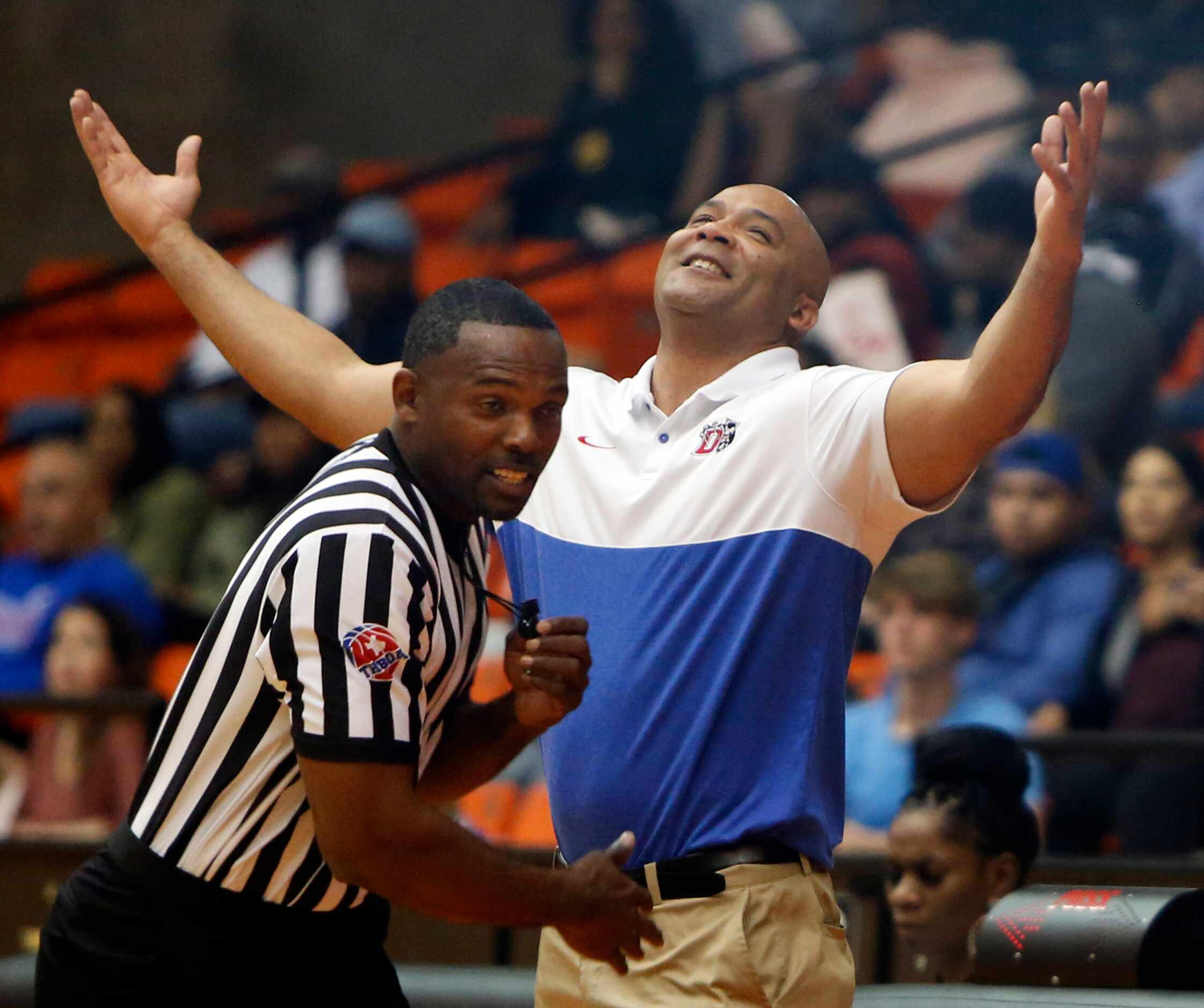 Duncanville head coach David Peavy reacts after his case on a missed call appeared to fall...