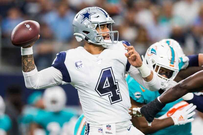 Dallas Cowboys quarterback Dak Prescott (4) makes a pass during the first quarter of an NFL...