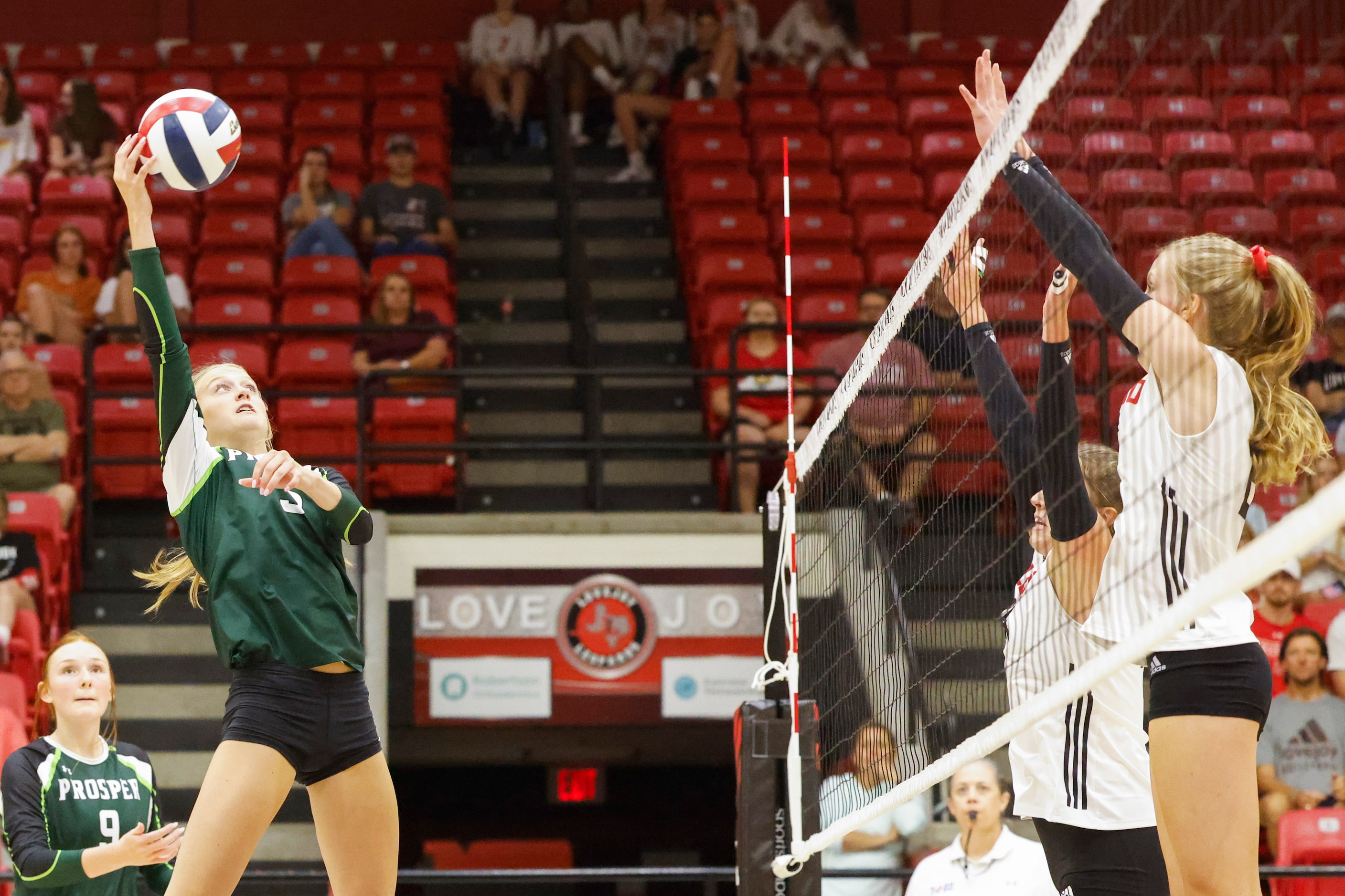 Prosper’s Sydney Thornton, left, hits the ball against Lovejoy during a season-opening match...