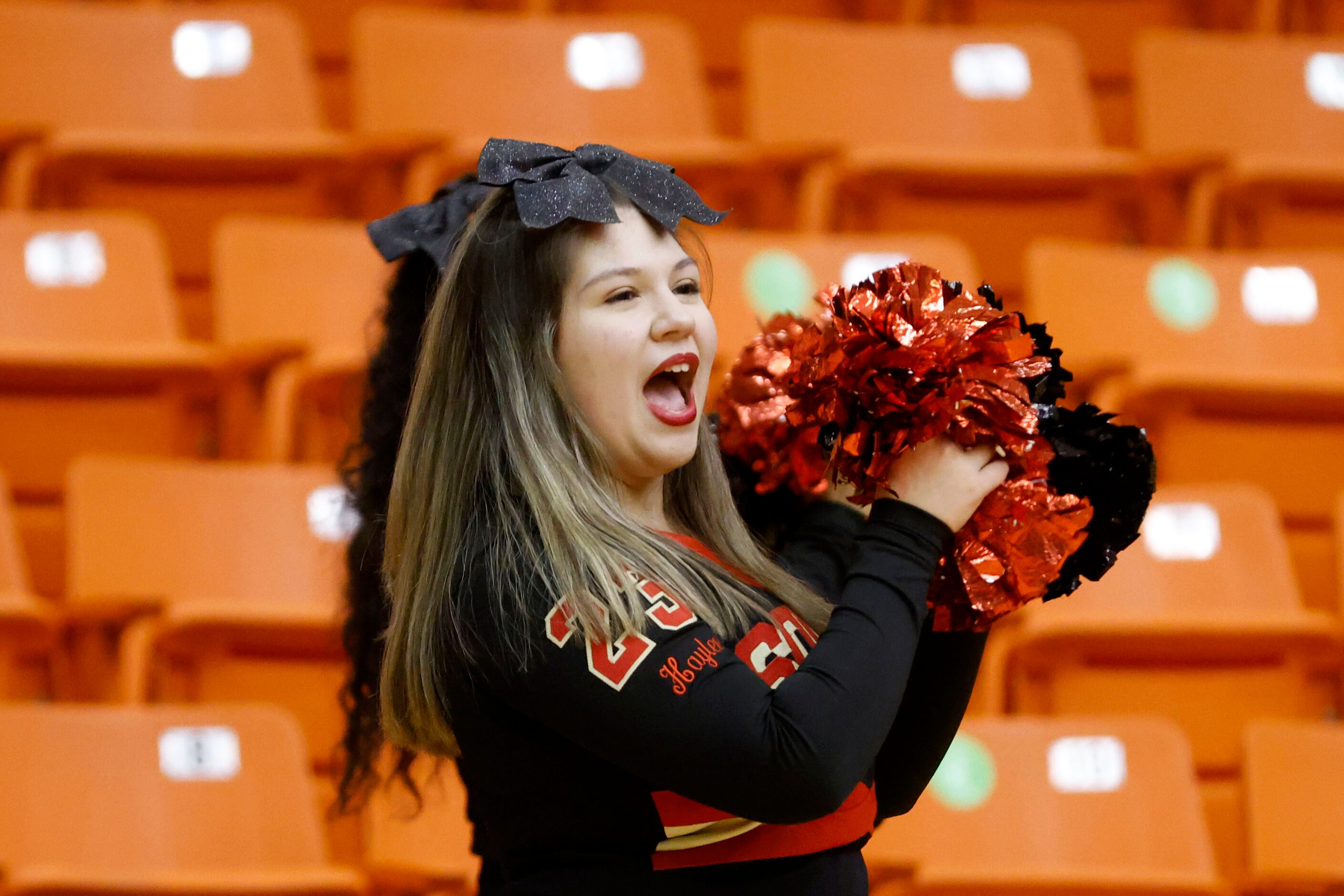 South Grand Prairie cheerleaders cheer for their team as they played Southlake Carroll...