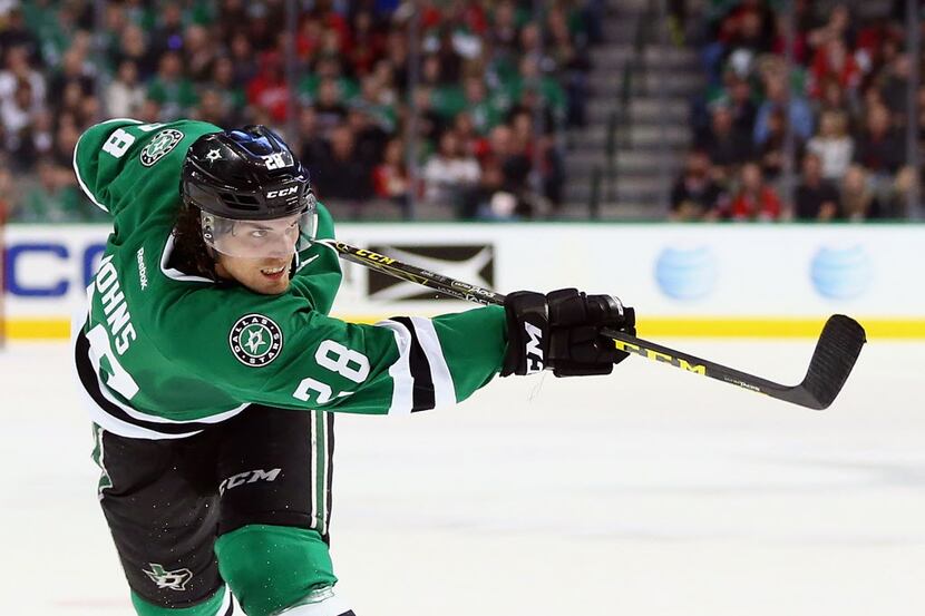 DALLAS, TX - MARCH 11:  Stephen Johns #28 of the Dallas Stars takes a shot against the...