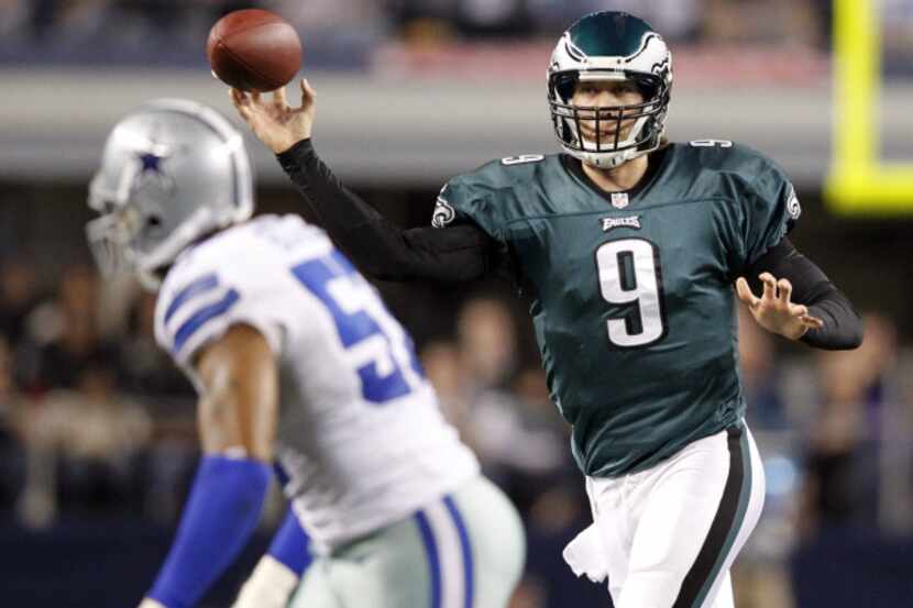 Philadelphia Eagles quarterback Nick Foles (9) looks to pass as Dallas Cowboys outside...