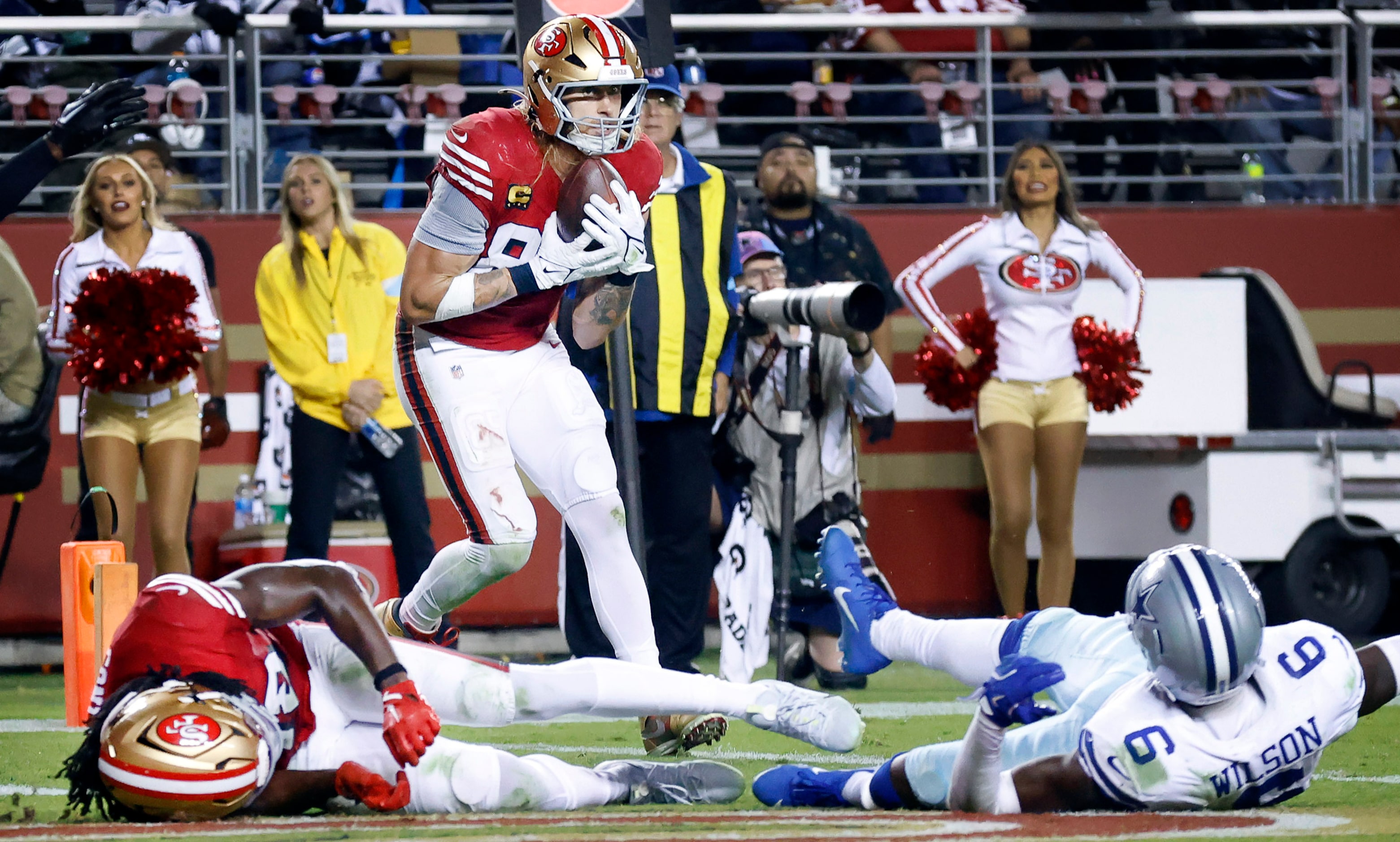 San Francisco 49ers tight end George Kittle (85) pulls down a third quarter touchdown pass...