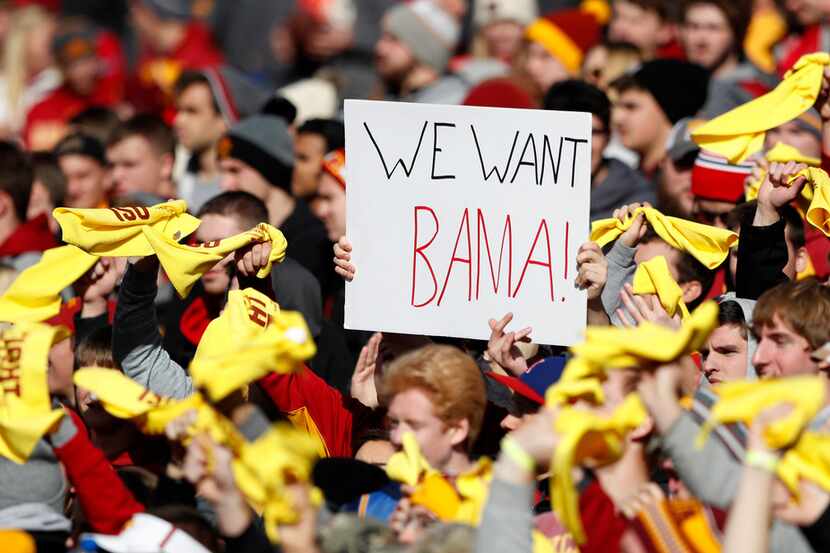 Iowa State fans cheer during the first half of an NCAA college football game against TCU,...