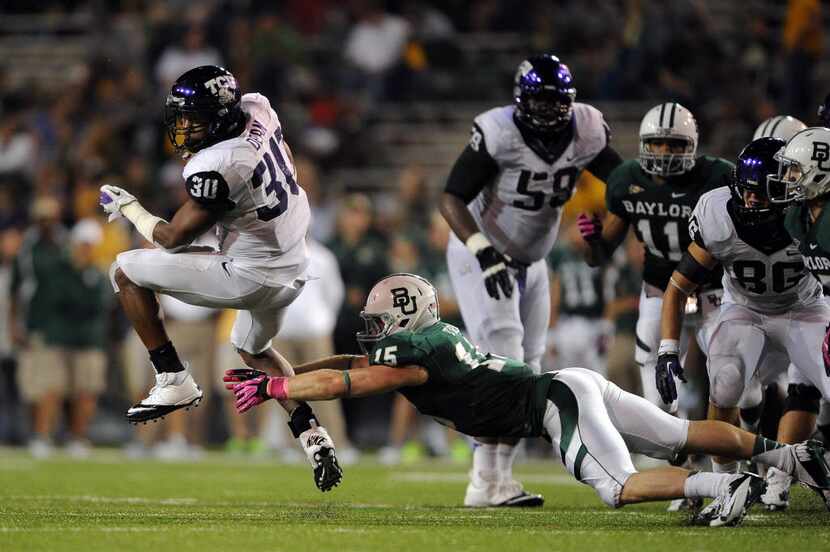 Oct 13, 2012; Waco, TX, USA; TCU Horned Frogs running back Aundre Dean (30) eludes Baylor...