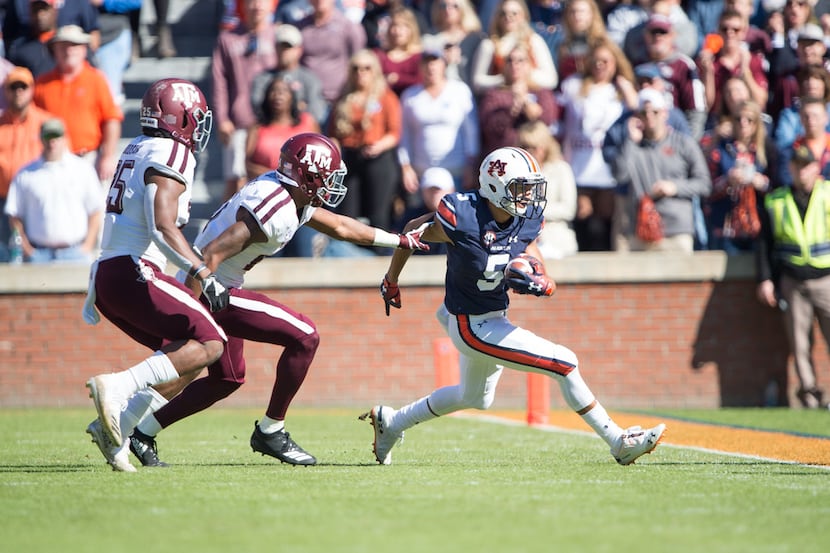 AUBURN, AL - NOVEMBER 3: Wide receiver Anthony Schwartz #5 of the Auburn Tigers gets chased...
