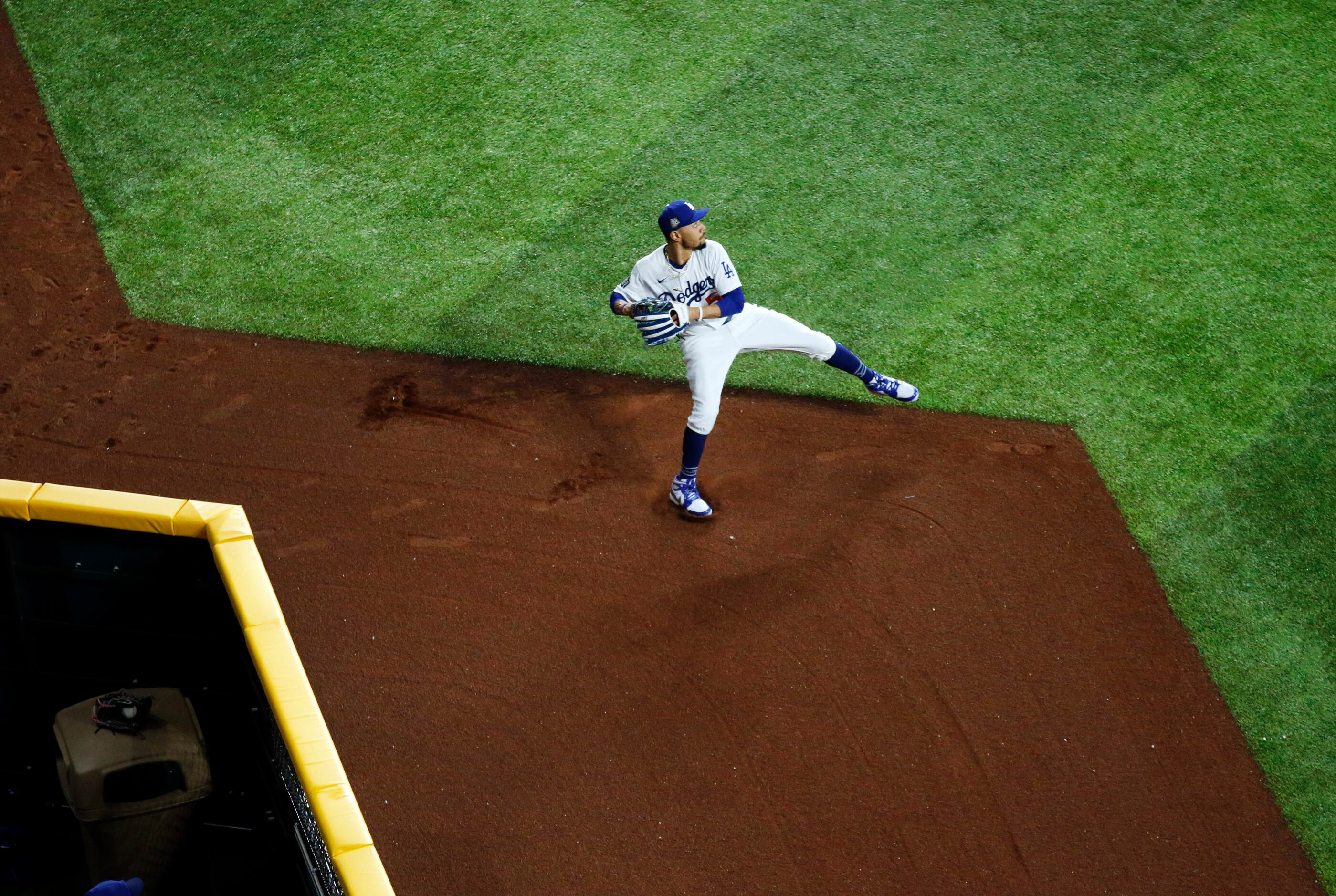 Los Angeles Dodgers right fielder Mookie Betts (50) plays a ball off the wall during the...