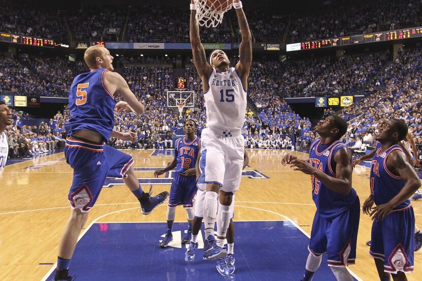 Kentucky Wildcats forward Willie Cauley-Stein (15) jams for two points during the first half...