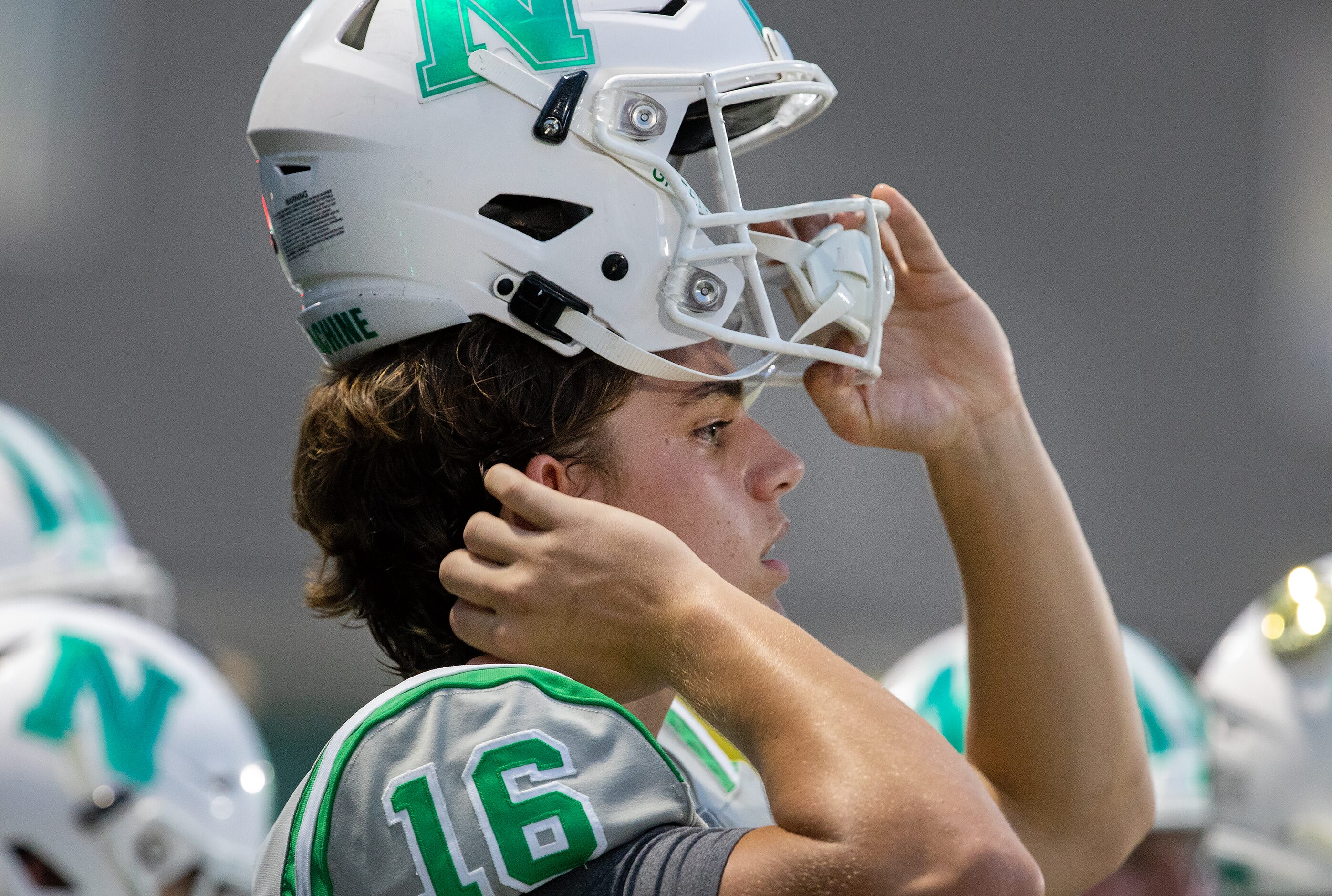 Arch Manning watches the action as he prepares to take the field as Newman High School takes...